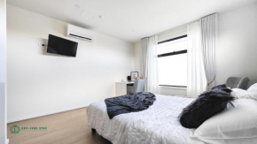 Queen Bed Stylish Suite with TV - Room 12